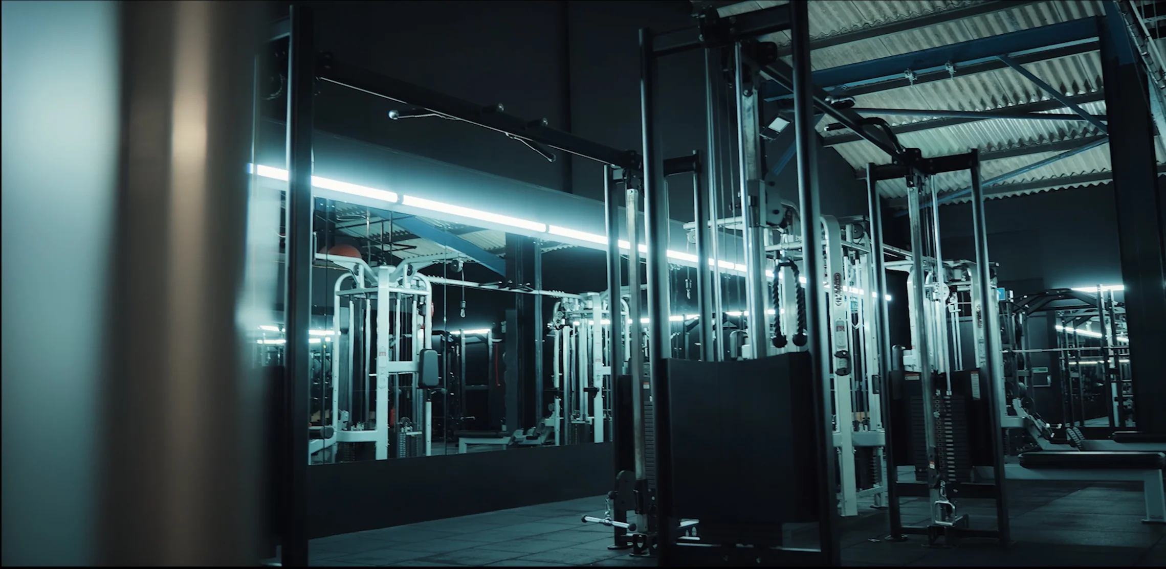 Free weights area with dumbbells 2.5kg-50kg, Olympic barbells, power racks and cable machines at Unit 9 Gym Neath