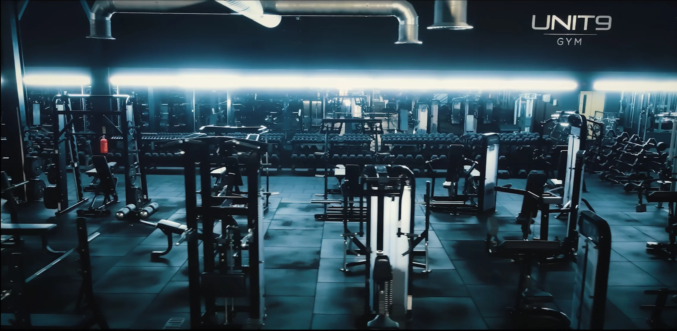 Strength and conditioning training with barbells and athletic equipment at Unit 9 Gym Neath Wales